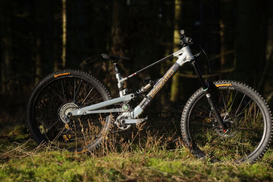 Dedicated FASTER: a lugged-carbon, high-pivot freeride eMTB with a Maxon motor and 195mm travel